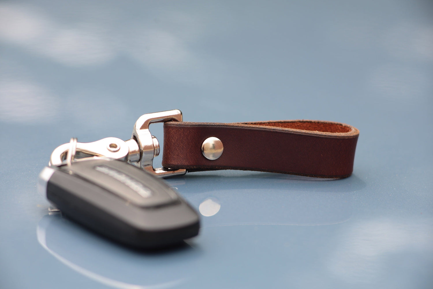The Clutch leather keychain with swivel snap and key fob