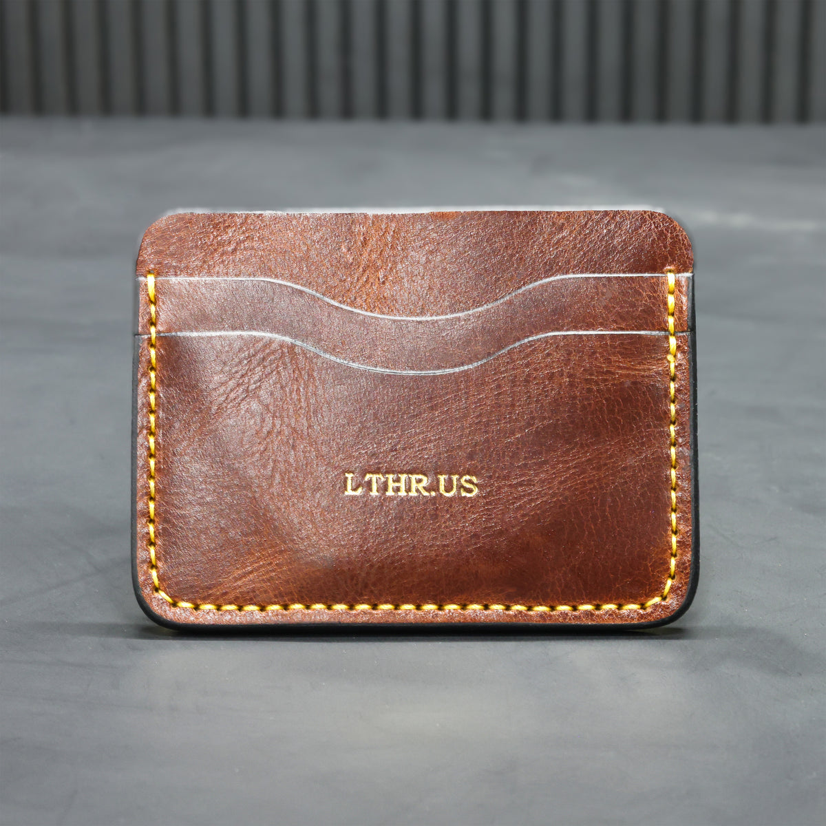The Townsend card wallet in Antique Brown, front