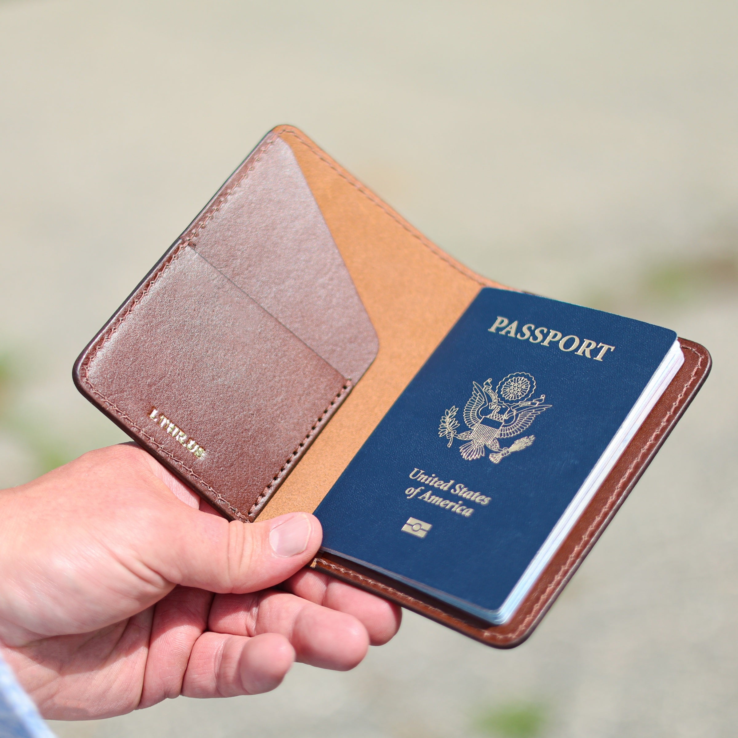 The Ambassador passport holder in Brown, interior pockets