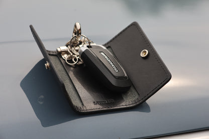 The Fort Wayne trifold key wallet in Black, open at an angle
