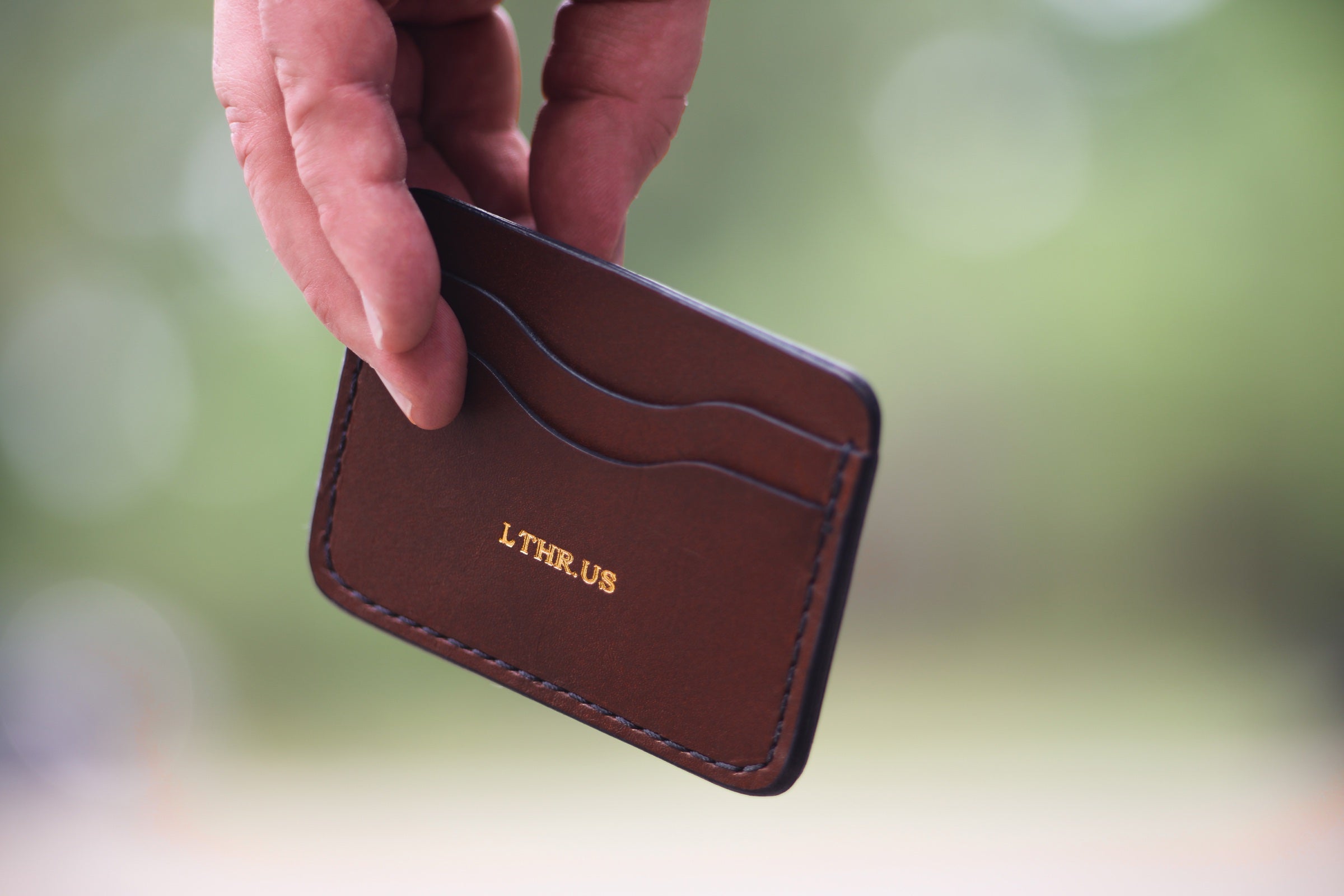 The Townsend card wallet in Antique Brown with gold stamp