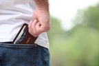 The Townsend card wallet in Antique Brown, pocket scale